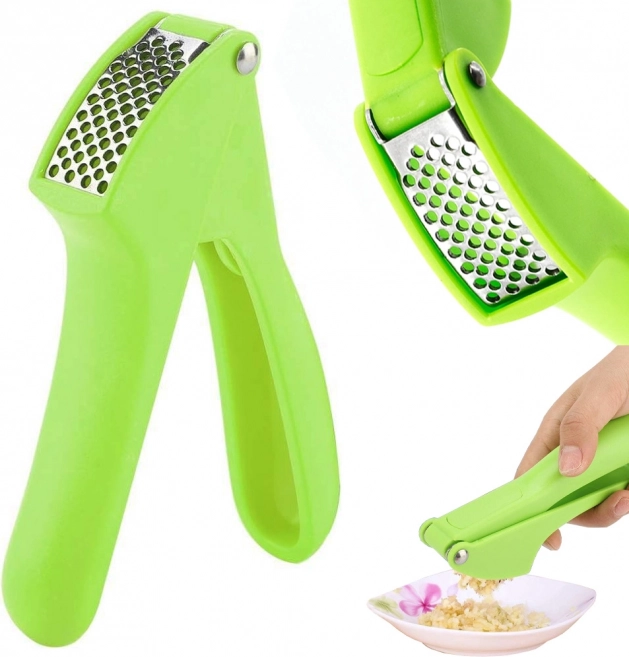 Manual garlic press with stainless steel basket