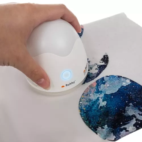 Combinatie van lamp en pluizenverwijderaar