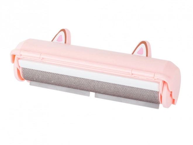 Roze roller voor het verwijderen van haren