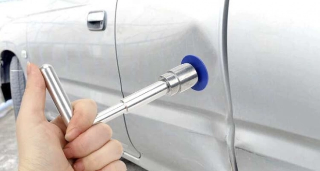 Set voor het verwijderen van deuken in de carrosserie van de auto