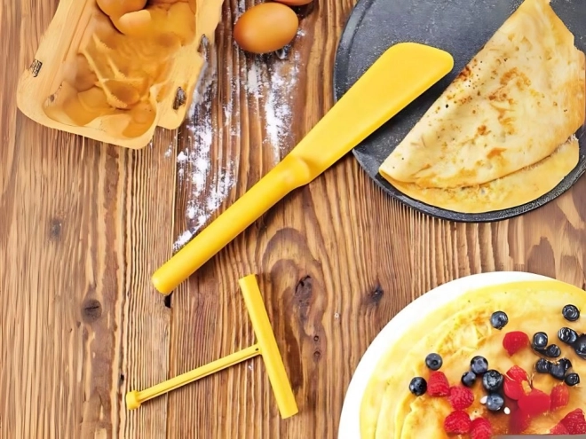 Spatel en roller voor pannenkoeken