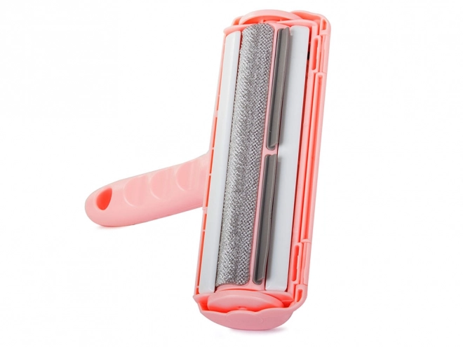 Roze roller voor het verwijderen van haren