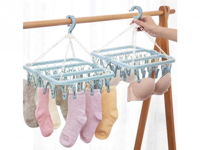 Hangend rek voor het drogen van sokken en wasgoed met 32 clips