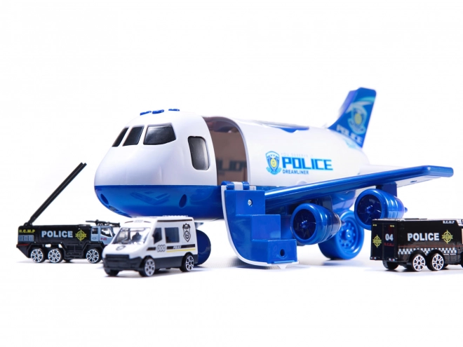 Vliegtuigtransporteur en 3 politieauto's