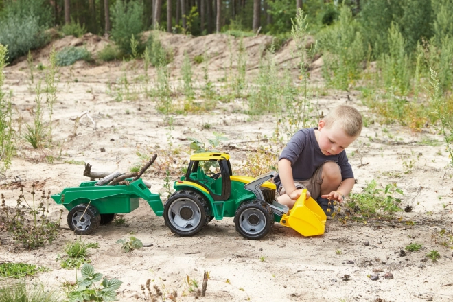 Traktor mit Schaufel und Anhänger