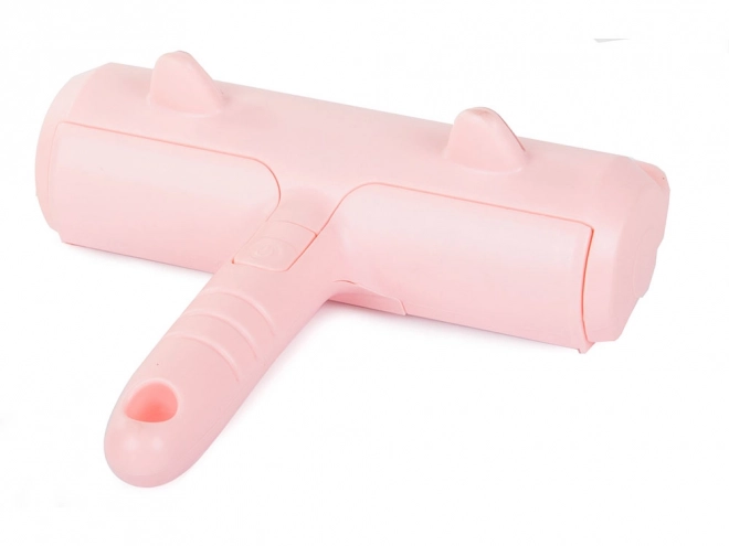 Roze roller voor het verwijderen van haren
