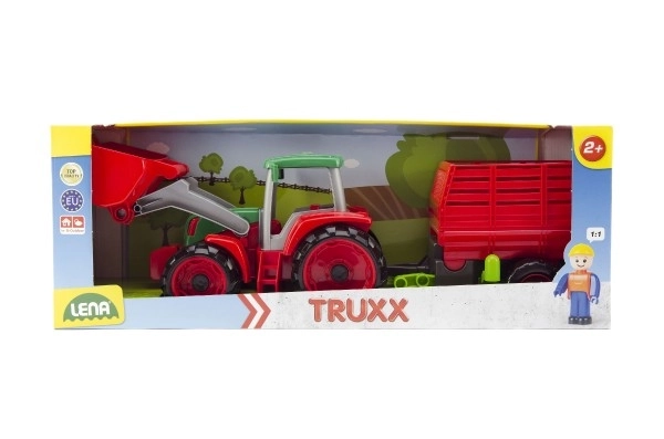 Auto Truxx tractor met hooiaanhanger en figuur in doos 53x19x16cm 24m+