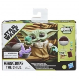 Star Wars figure of the Mandalorian child with vehicle