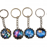 Round space-themed keychain