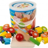 Wooden fruit and vegetable cutting set in a bucket