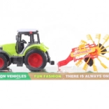 Plastic tractor with hay tedder for kids