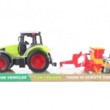 Plastic tractor with seeding trailer