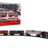 Plastic train set with light and sound, battery-powered, with tracks 104 × 68 cm